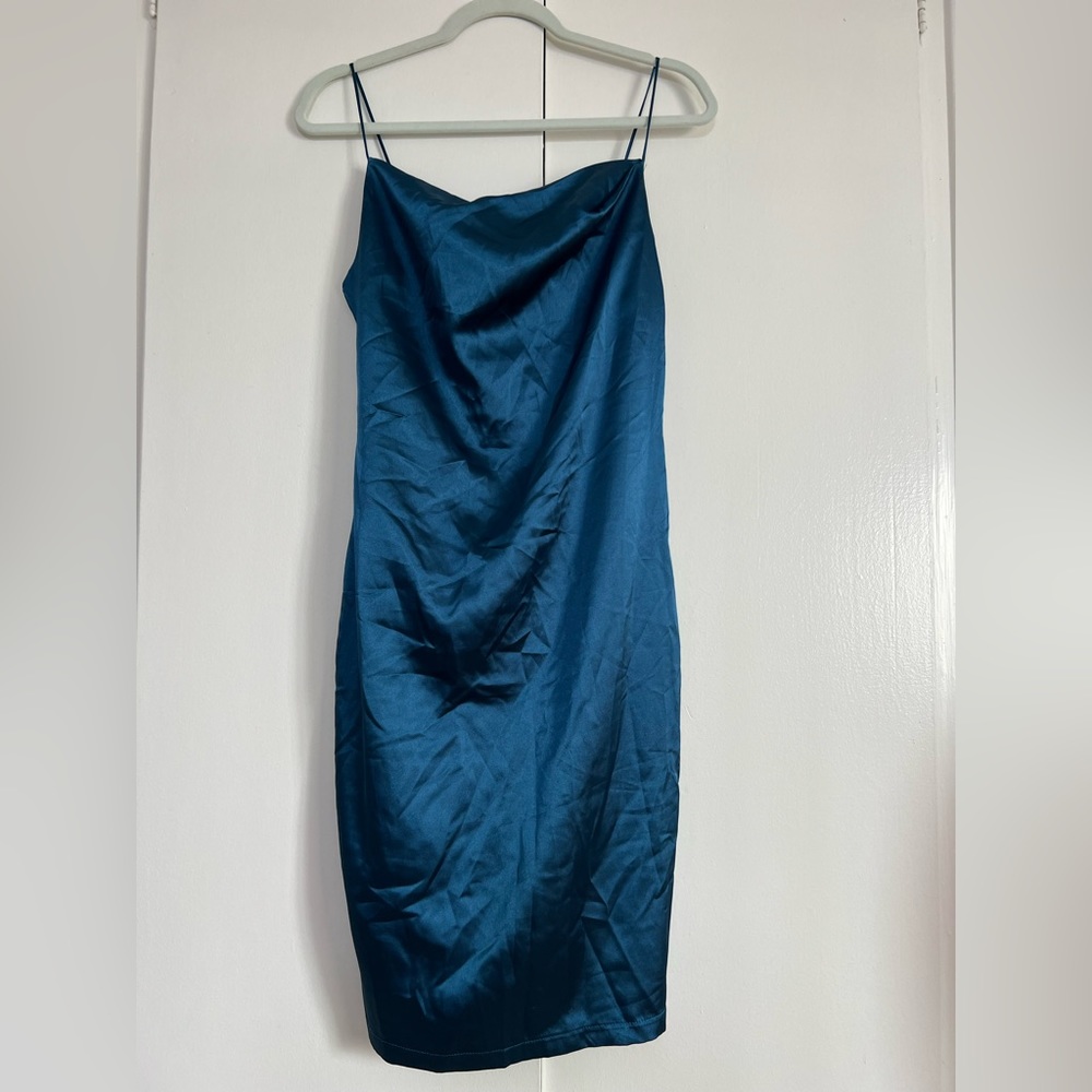 Emerald-colored satin dress